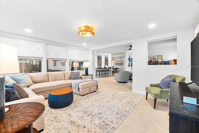 8848 Sunlit Cove Dr NE, Saint Petersburg, FL 33702 - living area featuring light tile patterned floors, a ceiling fan, and recessed lighting