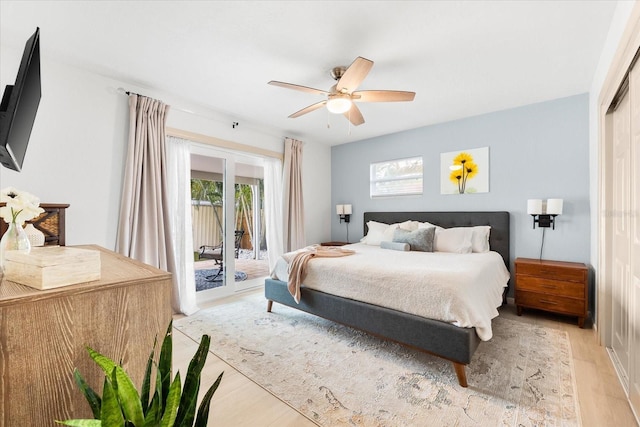 8848 Sunlit Cove Dr NE, Saint Petersburg, FL 33702 - bedroom with access to exterior, light wood-type flooring, and ceiling fan