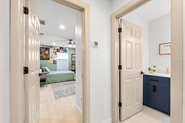 8848 Sunlit Cove Dr NE, Saint Petersburg, FL 33702 - corridor featuring recessed lighting and baseboards