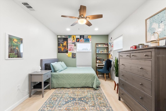 8848 Sunlit Cove Dr NE, Saint Petersburg, FL 33702 - bedroom with light wood-style floors, recessed lighting, baseboards, and ceiling fan