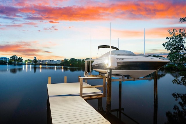 8848 Sunlit Cove Dr NE, Saint Petersburg, FL 33702 - dock area with boat lift and a water view