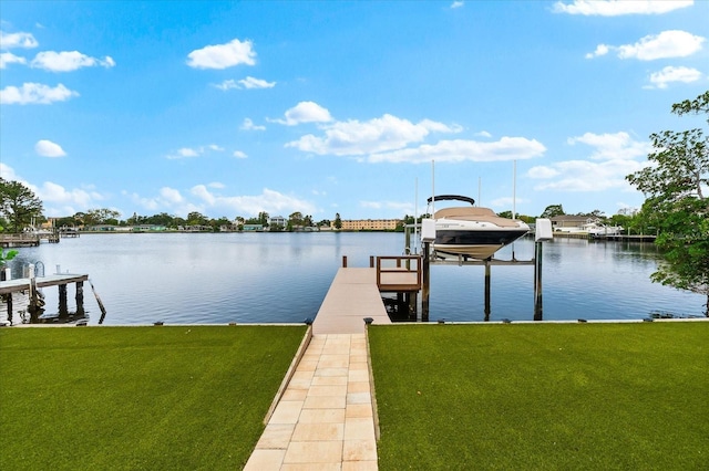 8848 Sunlit Cove Dr NE, Saint Petersburg, FL 33702 - dock with boat lift, a water view, and a yard