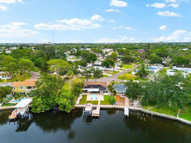 8848 Sunlit Cove Dr NE, Saint Petersburg, FL 33702 - aerial view of residential area featuring a large body of water and a tree filled landscape