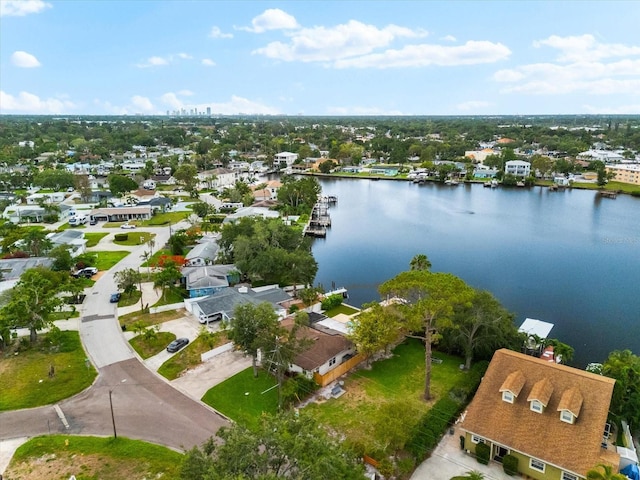 8848 Sunlit Cove Dr NE, Saint Petersburg, FL 33702 - aerial view of property and surrounding area with a large body of water and nearby suburban area