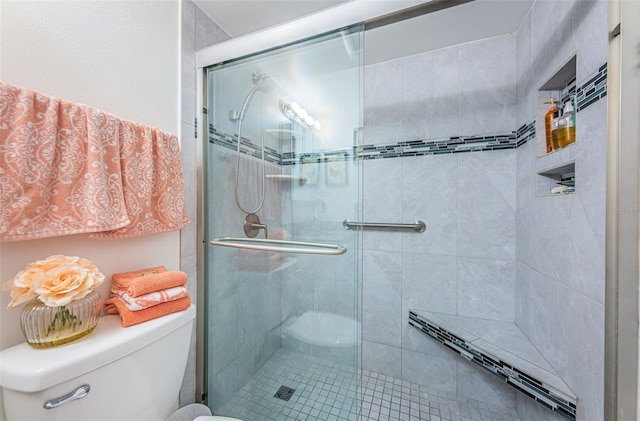 5694 40th Ter N Unit 423, Kenneth City, FL 33709 - bathroom featuring toilet and a stall shower