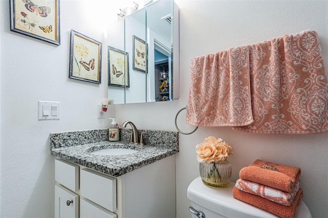 5694 40th Ter N Unit 423, Kenneth City, FL 33709 - bathroom with vanity and toilet