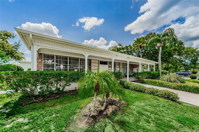 5694 40th Ter N Unit 423, Kenneth City, FL 33709 - ranch-style house featuring brick siding