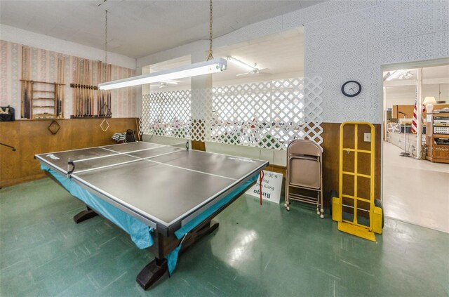 5694 40th Ter N Unit 423, Kenneth City, FL 33709 - recreation room featuring wallpapered walls and ceiling fan