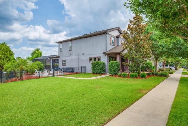 rear view of property with stucco siding