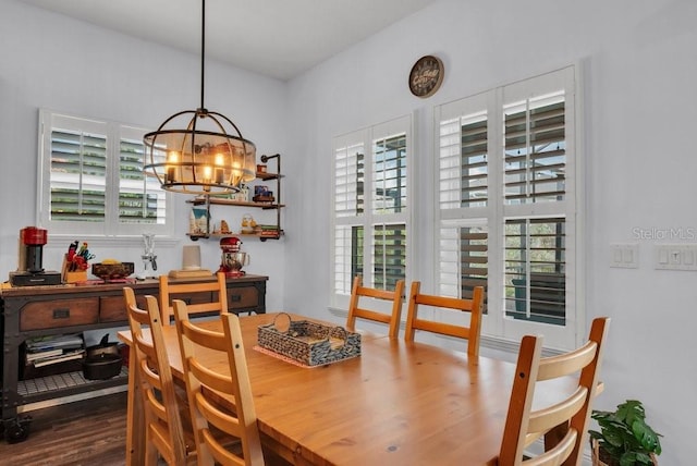 5724 Shell Ridge Dr, Lithia, FL 33547 - dining space featuring plenty of natural light, a chandelier, and wood finished floors
