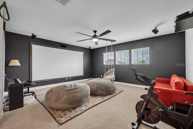 5724 Shell Ridge Dr, Lithia, FL 33547 - carpeted cinema room featuring ceiling fan and baseboards