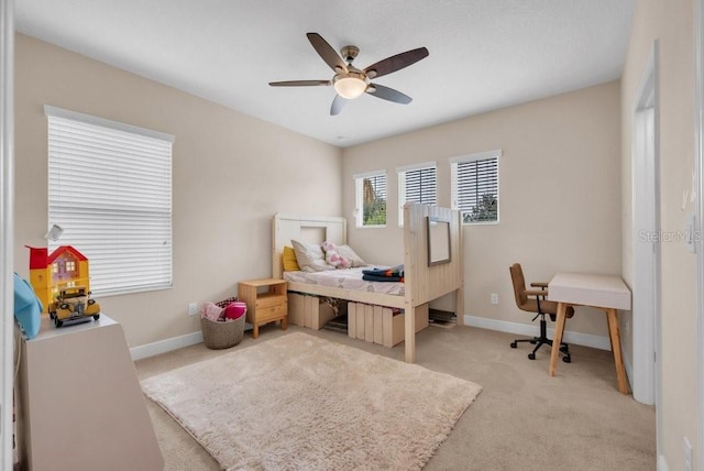 5724 Shell Ridge Dr, Lithia, FL 33547 - bedroom with light carpet and ceiling fan