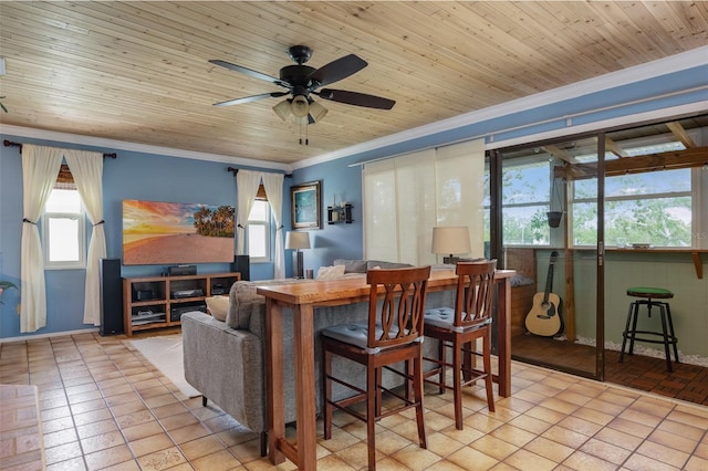 854 77th Ave N, Saint Petersburg, FL 33702 - living area with crown molding, a ceiling fan, tile patterned flooring, baseboards, and wood ceiling