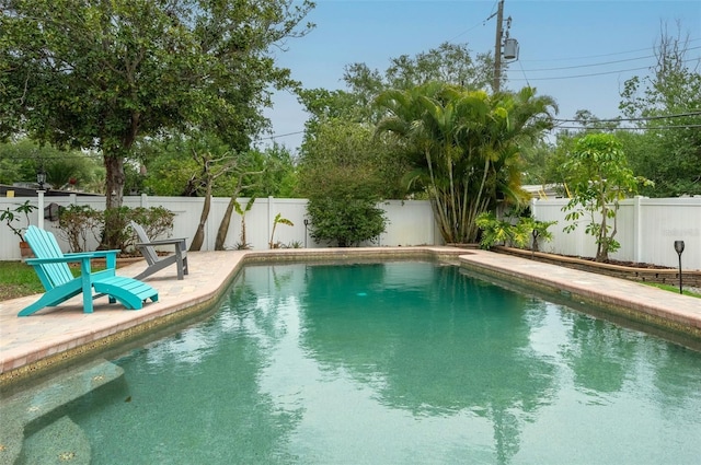 854 77th Ave N, Saint Petersburg, FL 33702 - view of pool featuring a fenced backyard and a patio