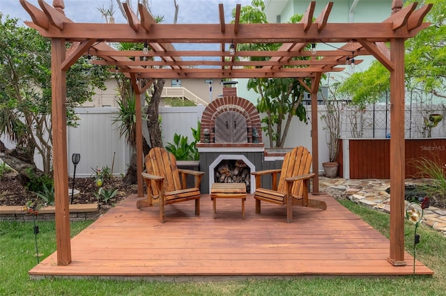 854 77th Ave N, Saint Petersburg, FL 33702 - wooden terrace with fence, an outdoor brick fireplace, and a pergola