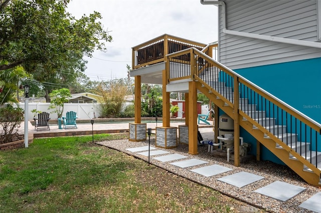854 77th Ave N, Saint Petersburg, FL 33702 - fenced yard featuring stairway, a patio, and a wooden deck
