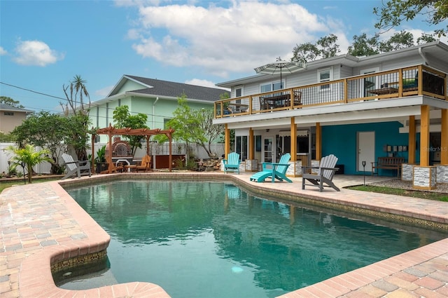 854 77th Ave N, Saint Petersburg, FL 33702 - back of property featuring a patio area, a balcony, and fence