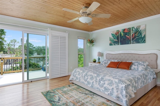 854 77th Ave N, Saint Petersburg, FL 33702 - bedroom featuring access to outside, ornamental molding, wood finished floors, wooden ceiling, and ceiling fan