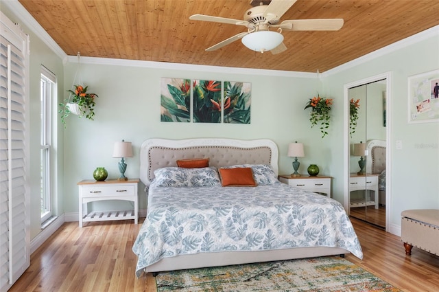 854 77th Ave N, Saint Petersburg, FL 33702 - bedroom featuring crown molding, wooden ceiling, wood finished floors, baseboards, and ceiling fan