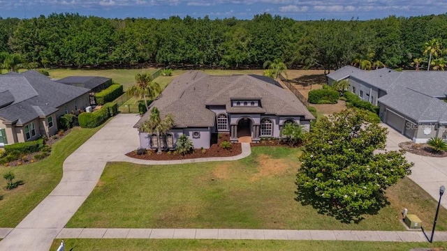 5507 Keeler Oak St, Lithia, FL 33547 - view of front of property featuring driveway and a front yard