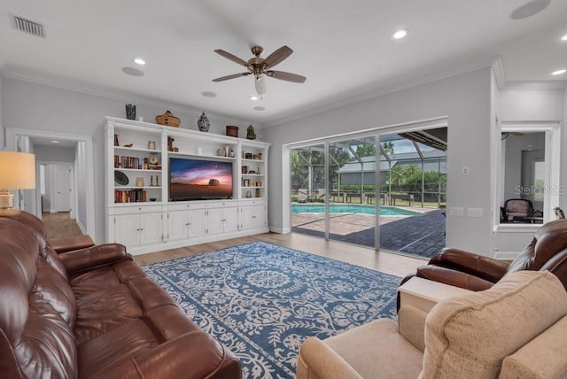 5507 Keeler Oak St, Lithia, FL 33547 - living area with a ceiling fan, wood finished floors, ornamental molding, and recessed lighting