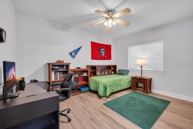 5507 Keeler Oak St, Lithia, FL 33547 - bedroom featuring wood finished floors, an office area, and ceiling fan