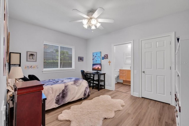 5507 Keeler Oak St, Lithia, FL 33547 - bedroom featuring light wood finished floors, connected bathroom, and a ceiling fan