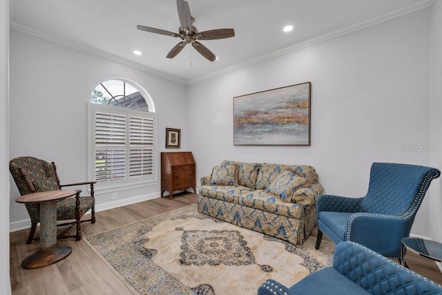 5507 Keeler Oak St, Lithia, FL 33547 - living area featuring wood finished floors, crown molding, ceiling fan, and recessed lighting