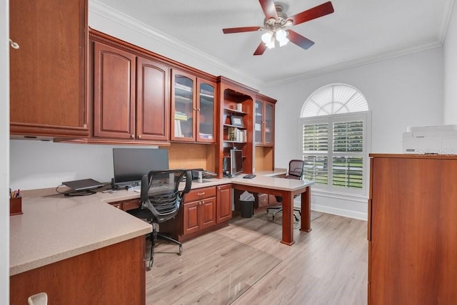 5507 Keeler Oak St, Lithia, FL 33547 - office area featuring a ceiling fan, light wood finished floors, ornamental molding, and built in desk