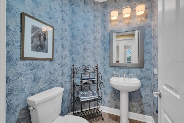 5507 Keeler Oak St, Lithia, FL 33547 - bathroom featuring wallpapered walls and wood finished floors