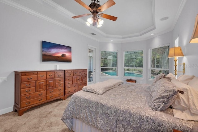 5507 Keeler Oak St, Lithia, FL 33547 - bedroom with a raised ceiling, ornamental molding, ceiling fan, and light tile patterned flooring