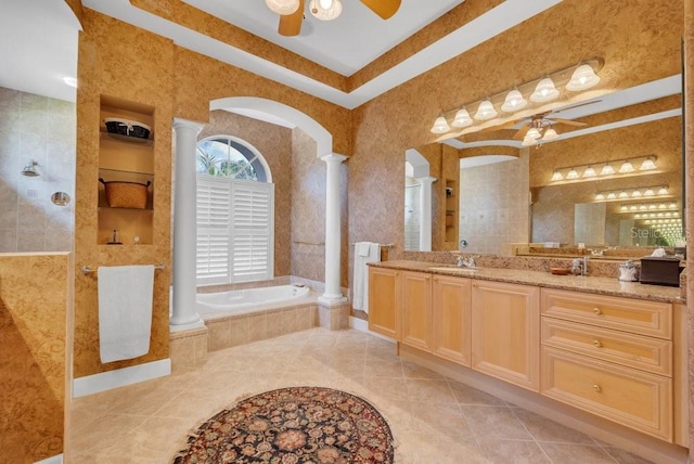 5507 Keeler Oak St, Lithia, FL 33547 - full bath with ceiling fan, a bath, vanity, and ornate columns