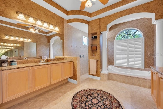5507 Keeler Oak St, Lithia, FL 33547 - full bathroom with a ceiling fan, vanity, a garden tub, walk in shower, and ornate columns