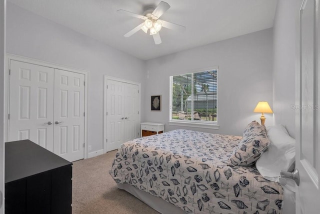 5507 Keeler Oak St, Lithia, FL 33547 - bedroom with multiple closets, carpet flooring, and a ceiling fan