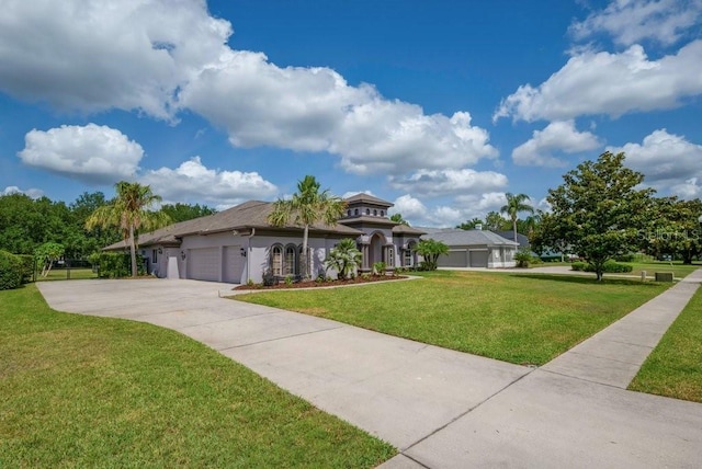 5507 Keeler Oak St, Lithia, FL 33547 - view of front facade featuring an attached garage, a front lawn, and concrete driveway
