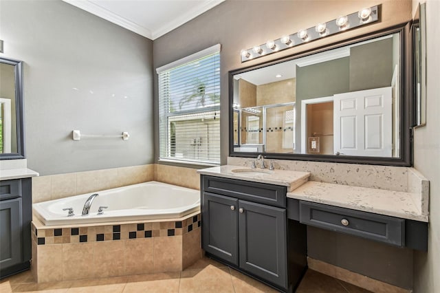16101 Cape Coral Dr, Wimauma, FL 33598 - bathroom with a shower stall, a garden tub, tile patterned flooring, vanity, and crown molding
