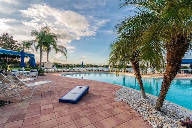 16101 Cape Coral Dr, Wimauma, FL 33598 - community pool with a patio