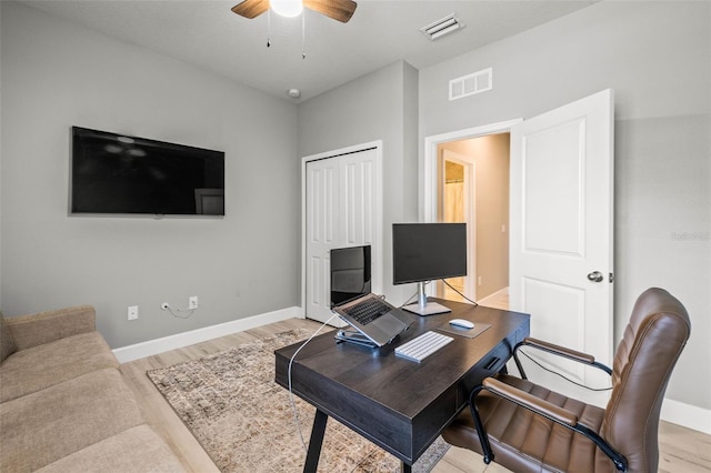 11322 Lake Lucaya Dr, Riverview, FL 33579 - office area featuring a ceiling fan, baseboards, and light wood-style floors