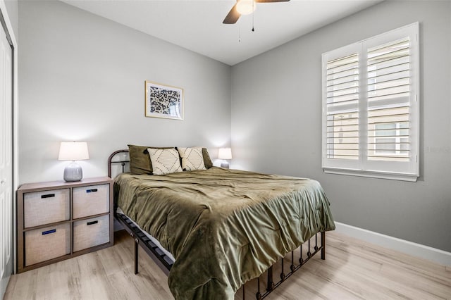 11322 Lake Lucaya Dr, Riverview, FL 33579 - bedroom featuring light wood-style floors, baseboards, and a ceiling fan