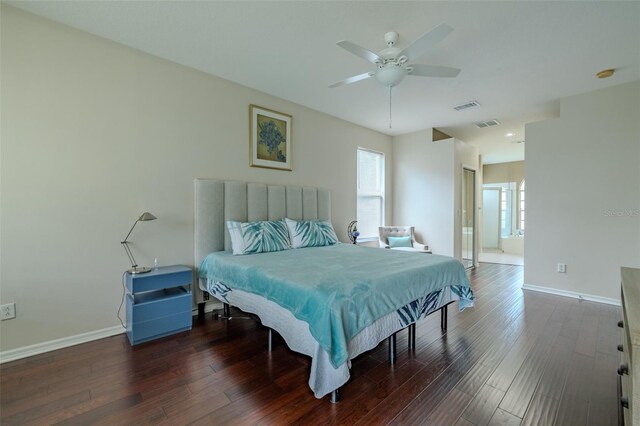 4612 River Overlook Dr, Valrico, FL 33596 - bedroom with multiple windows, wood finished floors, ensuite bath, and ceiling fan