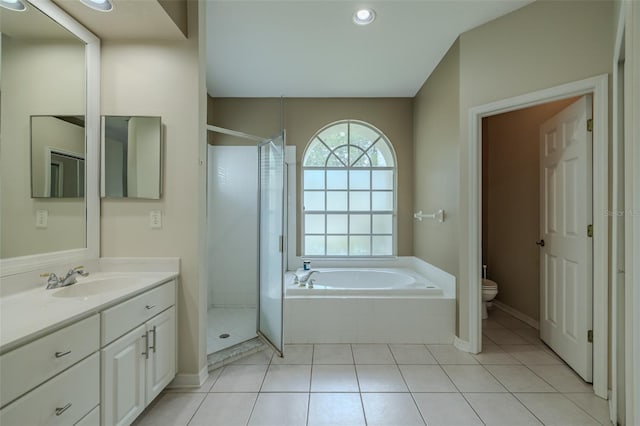 4612 River Overlook Dr, Valrico, FL 33596 - bathroom with a bath, vanity, a shower stall, tile patterned flooring, and recessed lighting