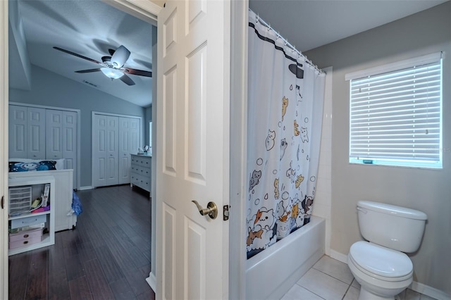 4612 River Overlook Dr, Valrico, FL 33596 - bathroom featuring shower / tub combo, a ceiling fan, lofted ceiling, and wood finished floors