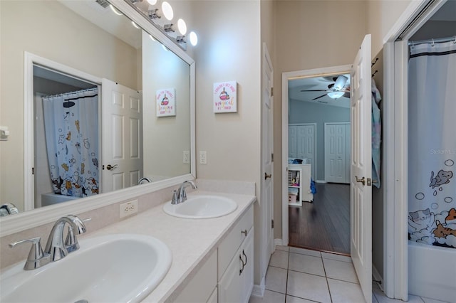 4612 River Overlook Dr, Valrico, FL 33596 - full bath featuring ceiling fan, tile patterned floors, double vanity, and a shower with curtain