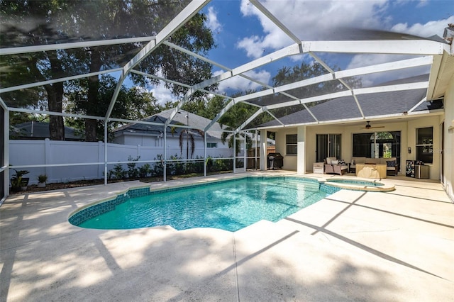 4612 River Overlook Dr, Valrico, FL 33596 - view of pool featuring a patio area, an outdoor living space, a ceiling fan, a pool with connected hot tub, and glass enclosure