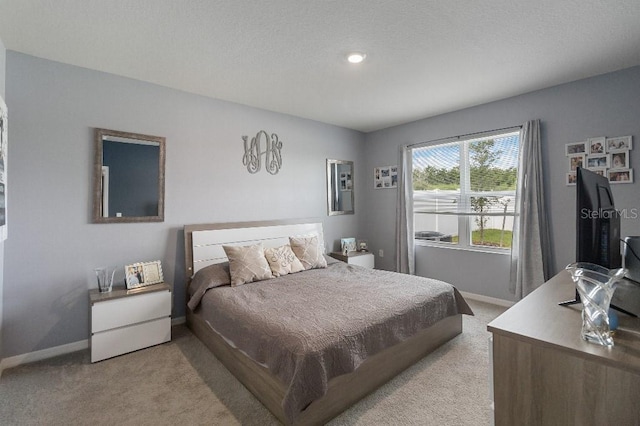 9532 Black Walnut Dr, Clermont, FL 34715 - bedroom featuring light colored carpet, baseboards, and recessed lighting