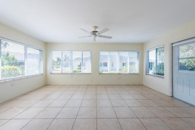 106 Silverbell Ct, Sun City Center, FL 33573 - unfurnished sunroom featuring tile patterned flooring
