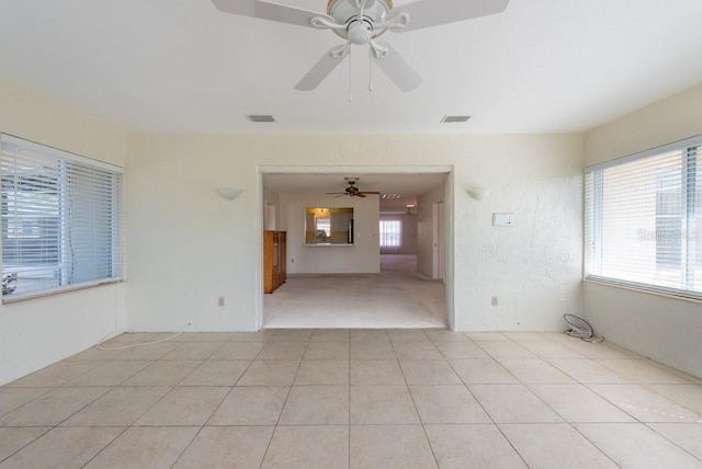 106 Silverbell Ct, Sun City Center, FL 33573 - empty room featuring ceiling fan and light tile patterned floors