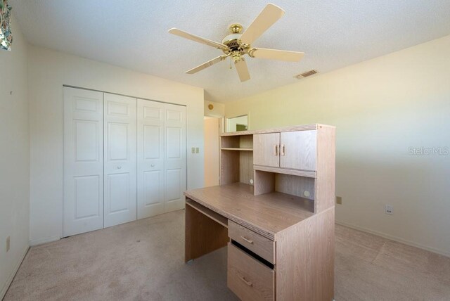 106 Silverbell Ct, Sun City Center, FL 33573 - unfurnished office with light colored carpet, a ceiling fan, and baseboards