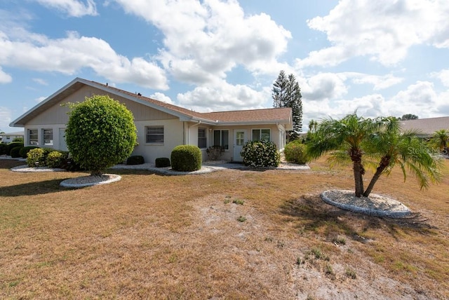 106 Silverbell Ct, Sun City Center, FL 33573 - view of front of house with a front yard