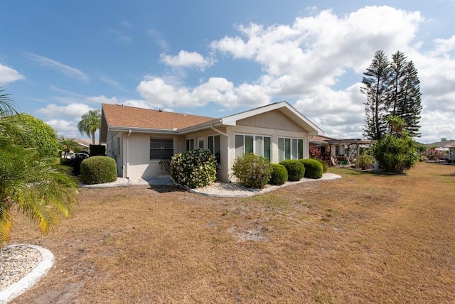 106 Silverbell Ct, Sun City Center, FL 33573 - view of property exterior with a yard